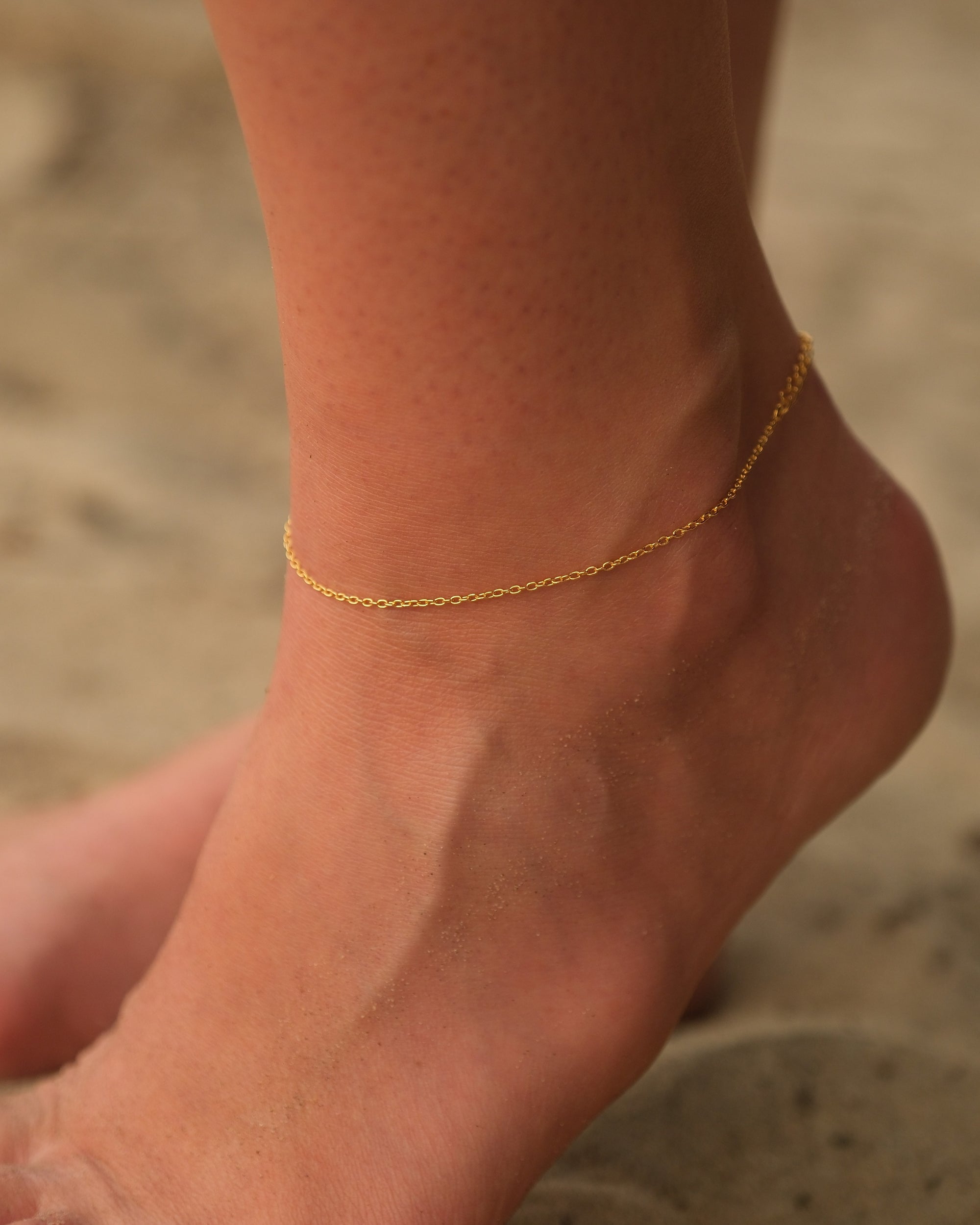 Model wearing BareBare anklet showing its minimalist and barefoot-inspired design