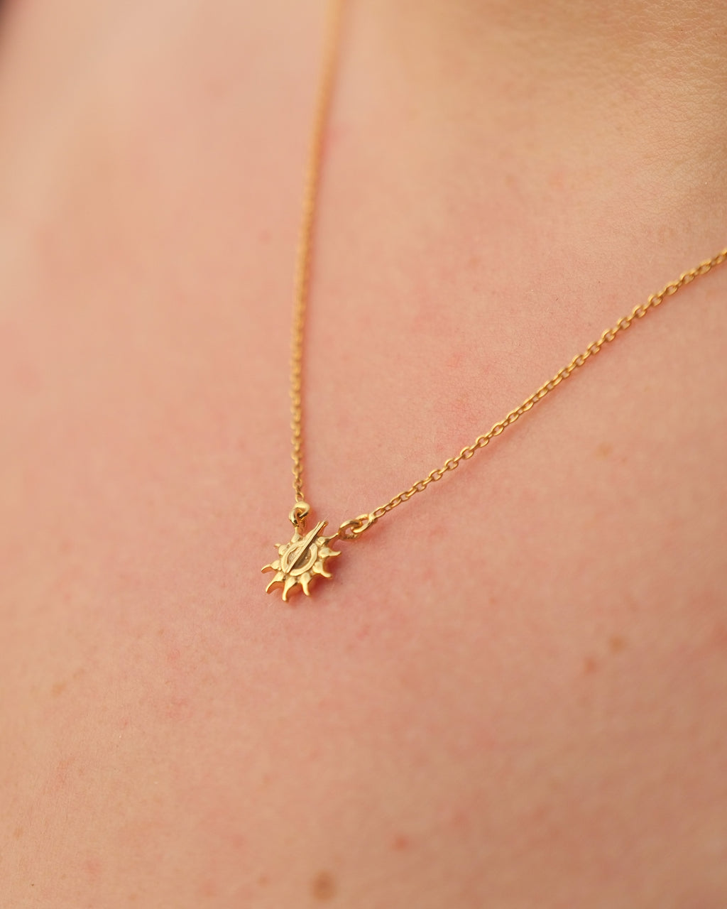 Close-up emphasizing the anti-tarnish and hypoallergenic properties of the 18KT gold vermeil necklace