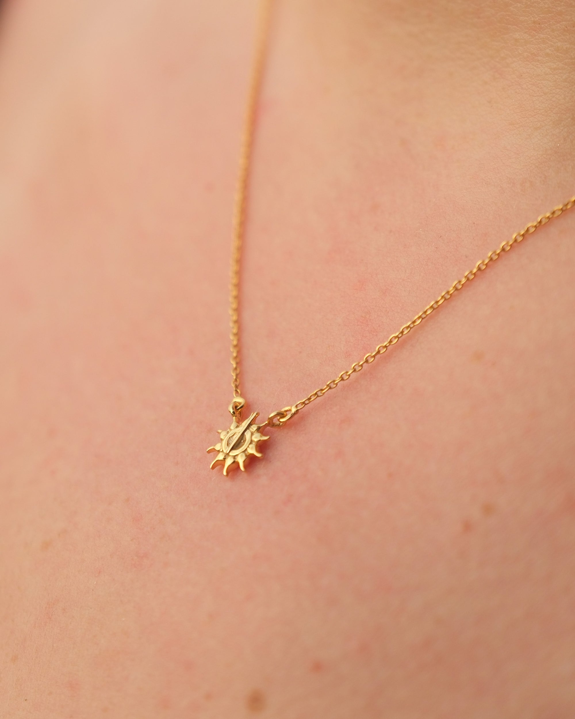 Close-up emphasizing the anti-tarnish and hypoallergenic properties of the 18KT gold vermeil necklace