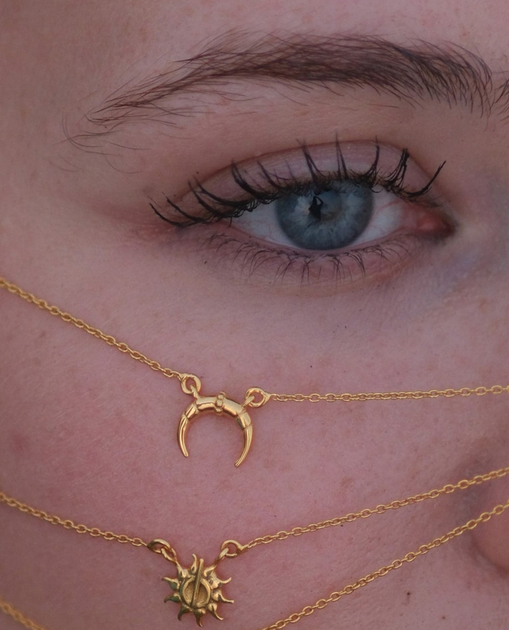 Close-up of hypoallergenic 18KT gold vermeil moon pendant necklace