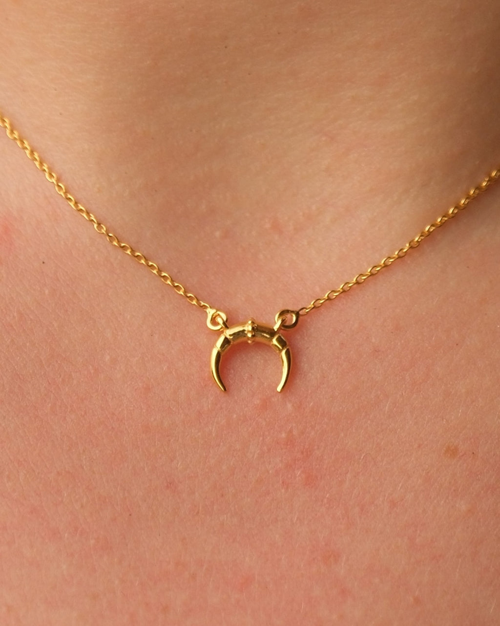 Close-up of hypoallergenic 18KT gold vermeil moon pendant necklace
