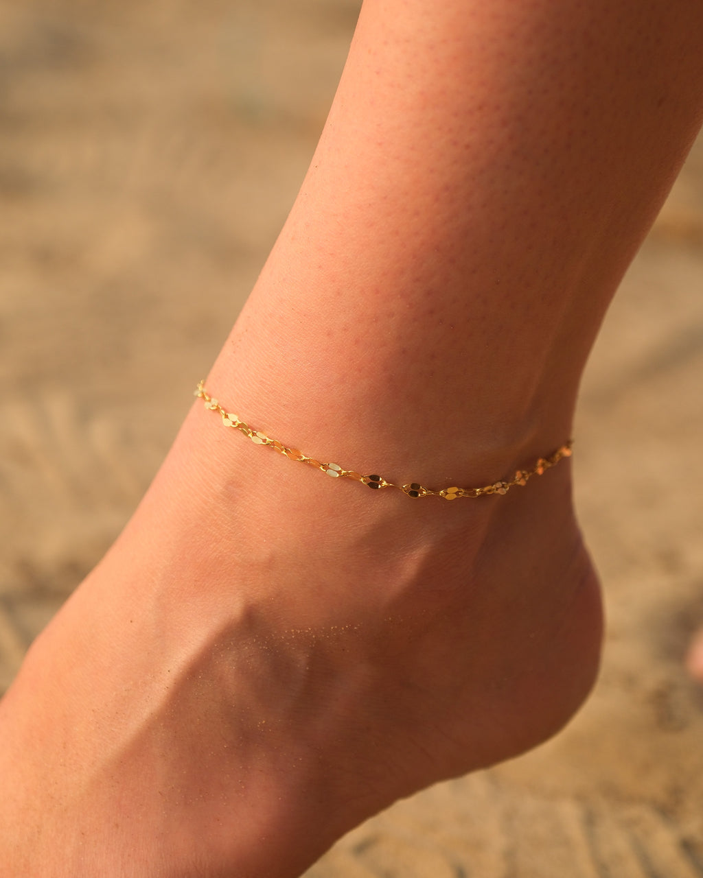 Side angle showcasing the delicate gold vermeil chain of the handcrafted Dune anklet