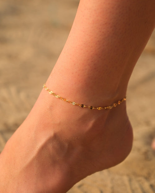 Side angle showcasing the delicate gold vermeil chain of the handcrafted Dune anklet